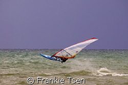 Windsurfer off beach of Kota Kinabalu, Sabah, Malaysia by Frankie Tsen 
